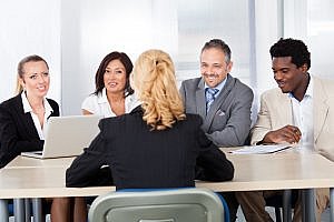 Female Woman Sitting At Interview